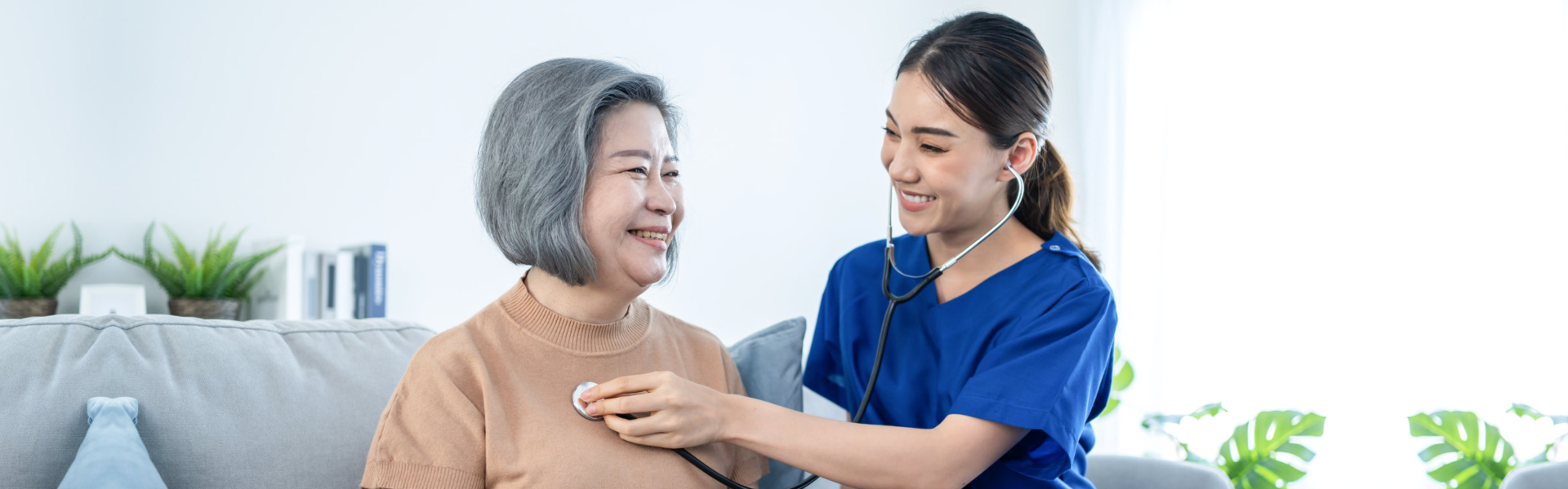 Caregiver checking elderly