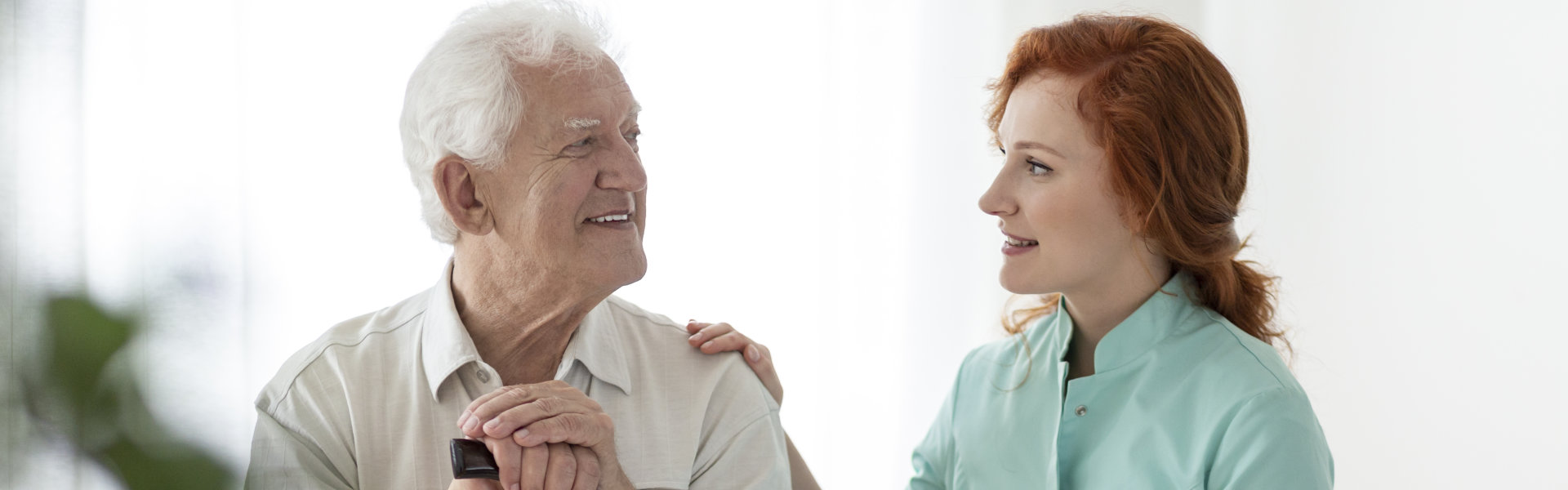 senior and young woman talking