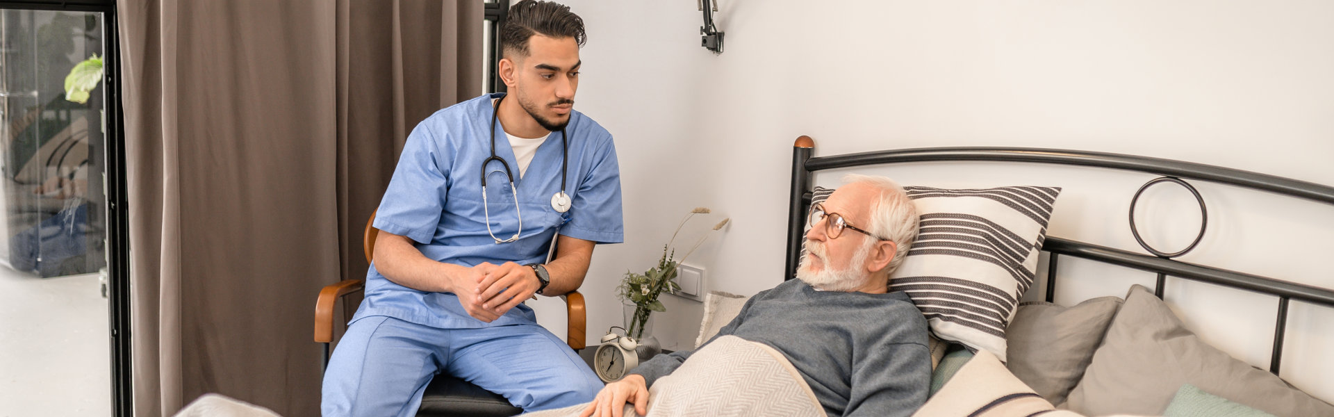 caregiver talking to senior